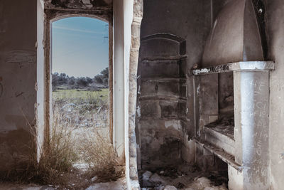 Damaged window in abandoned building