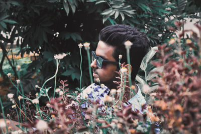 Portrait of young man outdoors
