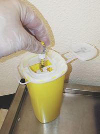 Close-up of hand holding drink