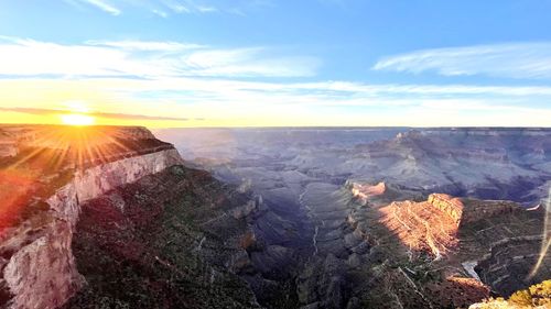 Scenic view of landscape against sky during sunset