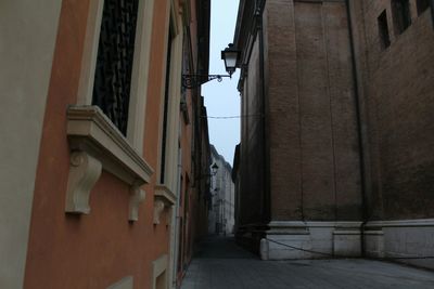 Narrow alley along buildings