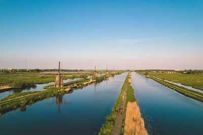 Bridge over river against clear sky