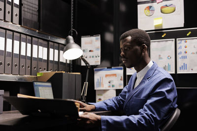 Portrait of businessman working at office