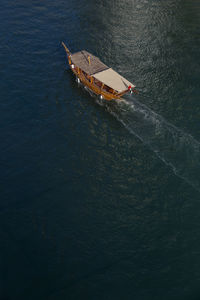 High angle view of ship sailing in sea