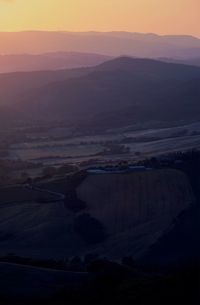 Scenic view of landscape against sky during sunset