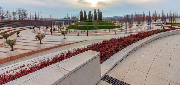 High angle view of park in city against sky