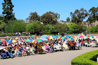 People at park against clear sky