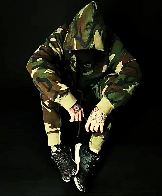 one man only, studio shot, front view, black background, one person, adults only, only men, people, men, adult, camouflage clothing