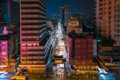 Illuminated buildings in city at night