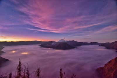 Scenic view of landscape against sky during sunset