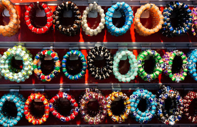 Multi colored candies for sale at market stall