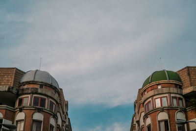 Low angle view of buildings against sky