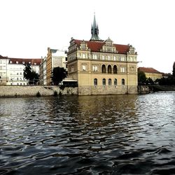 Buildings in distance with waterfront