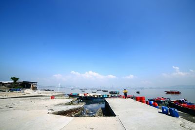 Scenic view of sea against blue sky