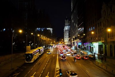 Traffic on city street at night