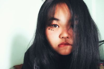 Close-up portrait of a beautiful young woman