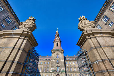 Low angle view of a building against blue sky