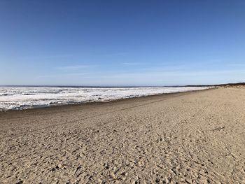 Scenic view of beach against sky