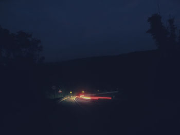 Cars on road at night