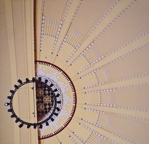Close-up of circular object on wall