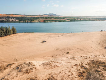 Scenic view of beach against sky