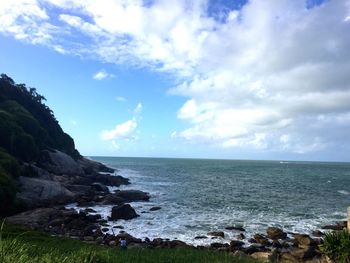 Scenic view of sea and cloudy sky