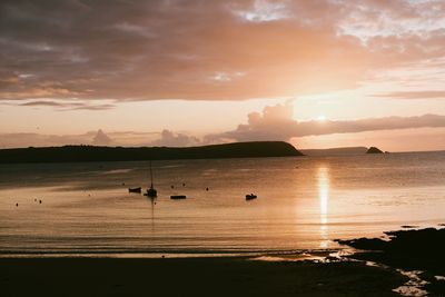 Scenic view of sea against sky during sunset