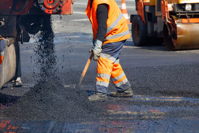 Man working at construction site in city