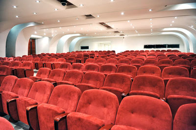 Empty red seats in auditorium