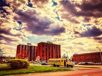 City buildings against cloudy sky