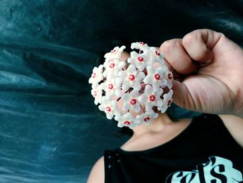 Midsection of woman holding ice cream