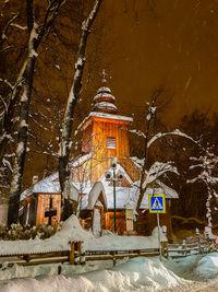 Graffiti on building covered with snow