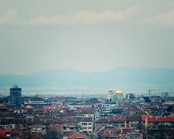 High angle shot of townscape against sky