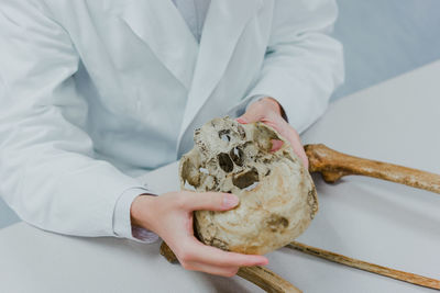 Midsection of man preparing food