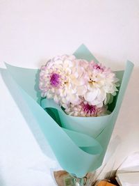 High angle view of white flower vase on table