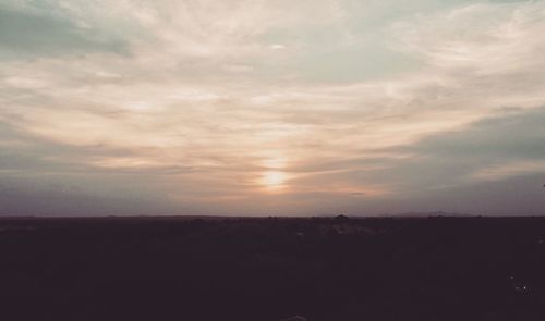 Scenic view of silhouette landscape against sky during sunset