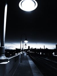 Illuminated street lights at night