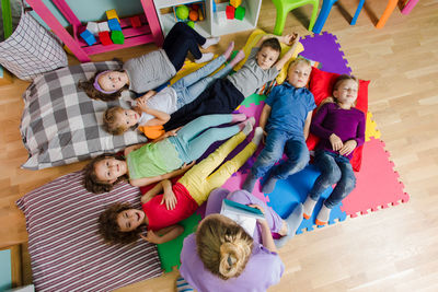 High angle view of people on multi colored umbrellas