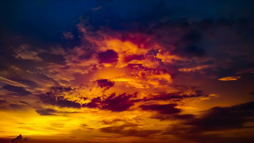 Low angle view of clouds in sky during sunset