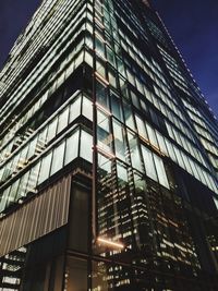 Low angle view of modern building against sky in city