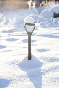 Spade in snow, sweden