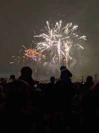 Firework display at night