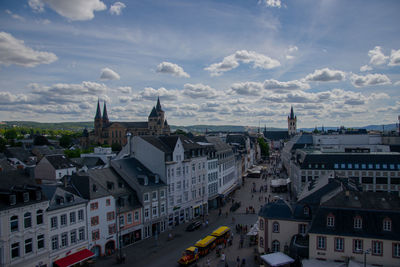 High angle view of street amidst buildings in city