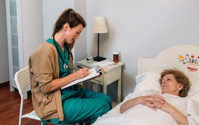 Doctor examining patient at hospital