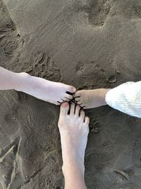 Low section of people on beach