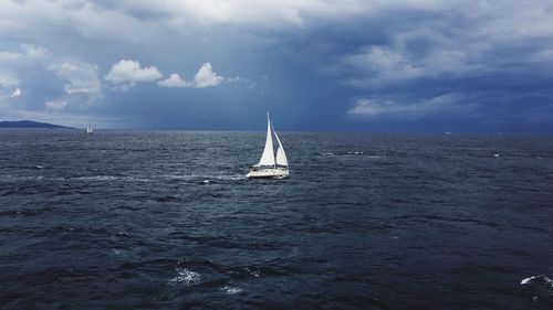 Sailboat sailing on sea