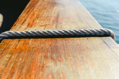 Close-up of wooden post on pier