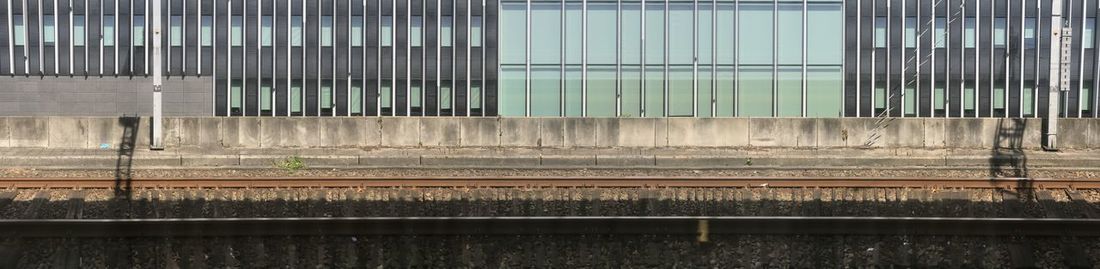 Reflection of building on glass window