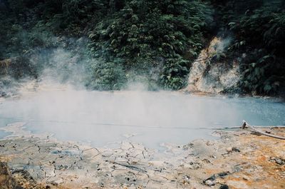 High angle view of smoke emitting from hot spring