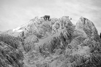 Rock formations on mountain against sky